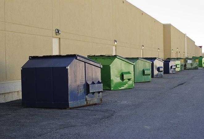 a pack of different construction bins lined up for service in Alpine, UT